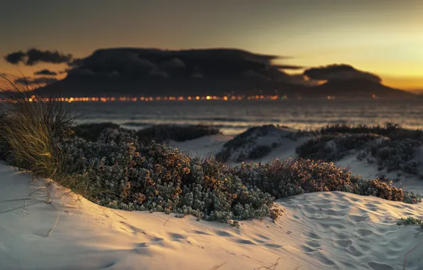 Sand, sea, beach, grass, clouds, sunset, mountains, lights