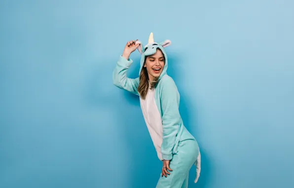 Picture woman, costume, unicorn, posing, playfully, winsome