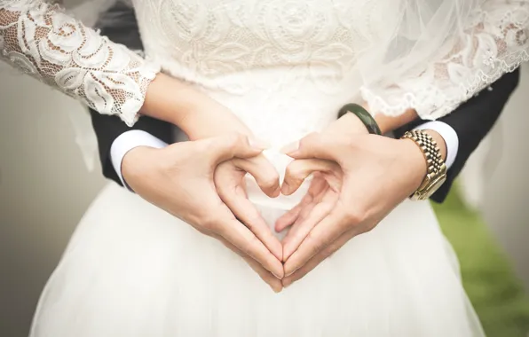 Heart, hands, the bride, the groom, the couple