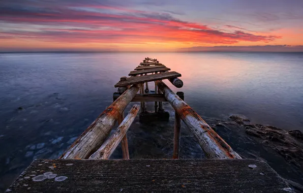 Picture the evening, Italy, Tuscany, Tirrenico sea, the old pier