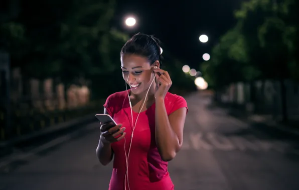 Trees, night, lights, smile, street, makeup, headphones, brunette