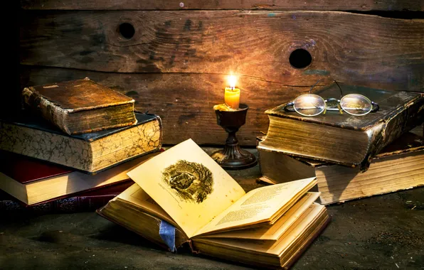 Books, candle, glasses, By candle light