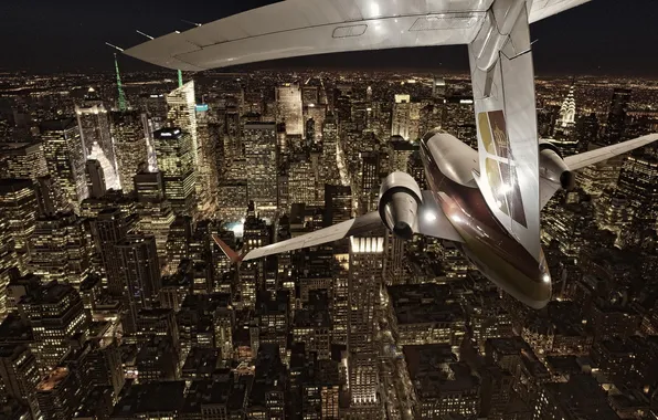Picture night, the city, the plane, New York