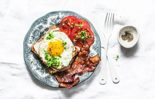 Breakfast, pepper, tomatoes, toast, bacon and eggs