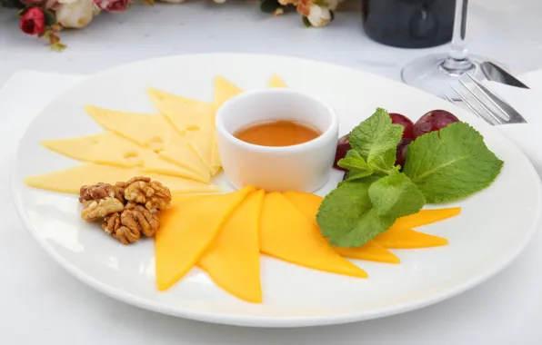 Cheese, honey, grapes, nuts, mint