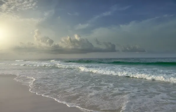 Picture sand, water, the sun, the ocean