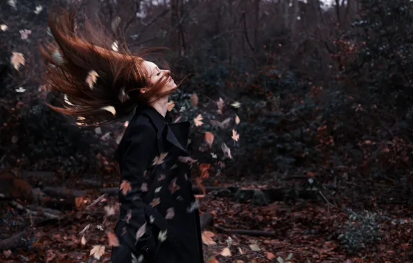 Leaves, girl, the wind, the situation