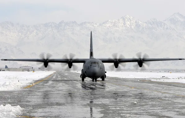 Picture the plane, the airfield, A C-130 Hercules