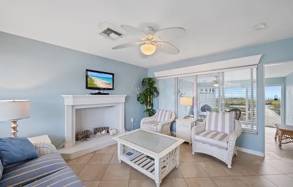 Design, style, room, interior, fireplace, living room, oceanfront villa