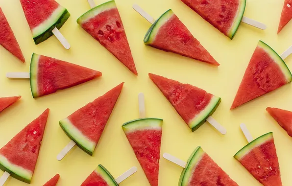 Watermelon, yellow background, a lot, slices, slices, on a stick