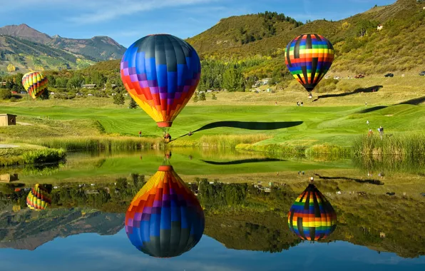 Picture the sky, mountains, lake, balloon