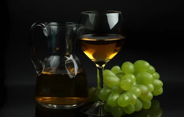 Wine, glass, grapes, pitcher, black background