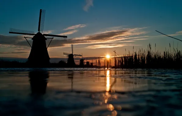The sky, grass, the sun, sunset, river, channel, windmill