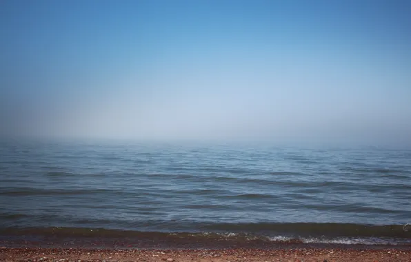 Sand, sea, the sky, water, fog, stones, wave, horizon