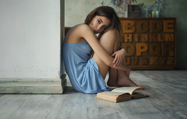 Picture sadness, girl, book, sitting, on the floor, Sergey Fat, Eva Reber
