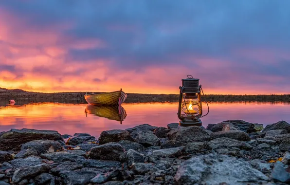 Picture lake, stones, boat, lamp