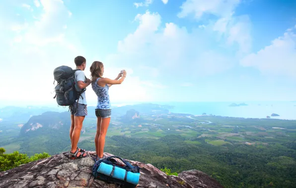 Picture sea, girl, clouds, mountains, height, valley, guy, tourism