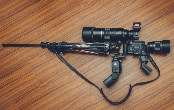 Weapons, camera, tripod