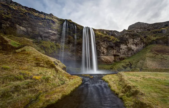 Picture the sky, mountains, rocks, waterfall