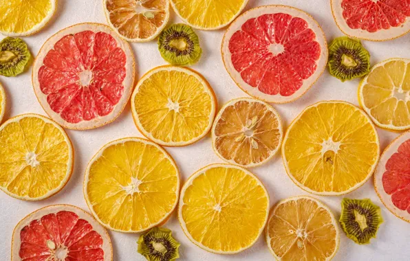 Oranges, kiwi, fruit, light background, circles, a lot, lemons, slices