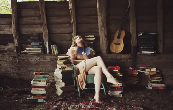 Picture girl, books, guitar