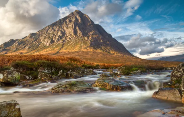 Picture the sky, clouds, mountains, river, stones, rocks