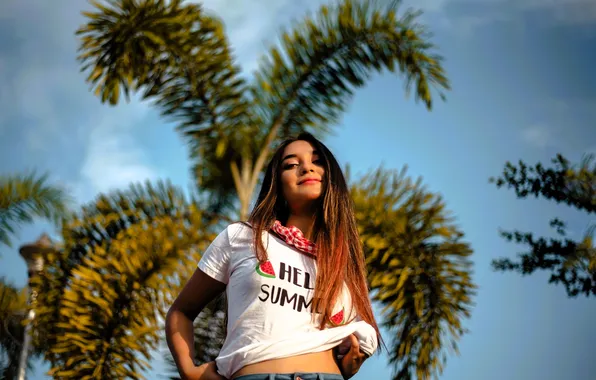 The sky, palm trees, jeans, t-shirt, brown hair, shawl