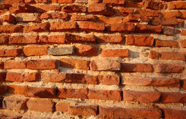 Picture light, wall, pattern, shadows, worn-out bricks
