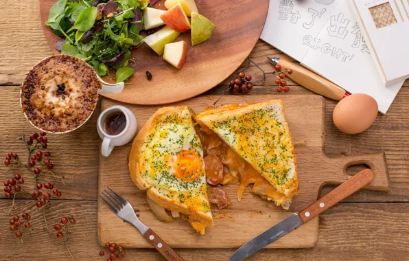 Scrambled eggs, sandwich, salad