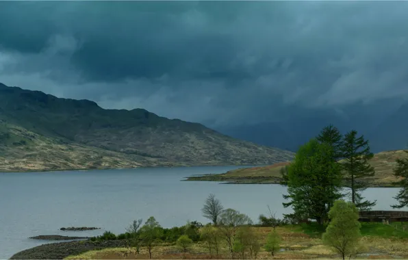 The sky, trees, mountains, clouds, lake