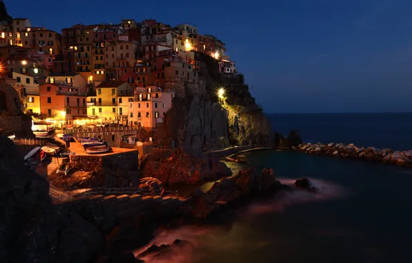 Sea, night, the city, lights, stones, shore, coast, building