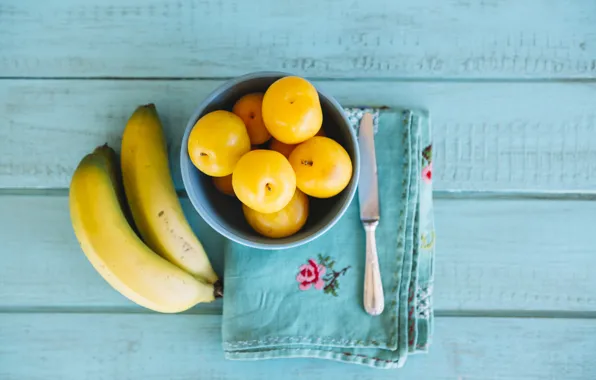 Plate, bananas, plum, wood, blue background, frucht
