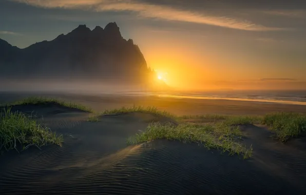 Sea, the sky, grass, the sun, light, mountains, fog, rocks