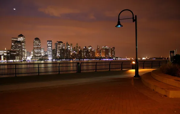 Picture the city, lights, skyscrapers, evening