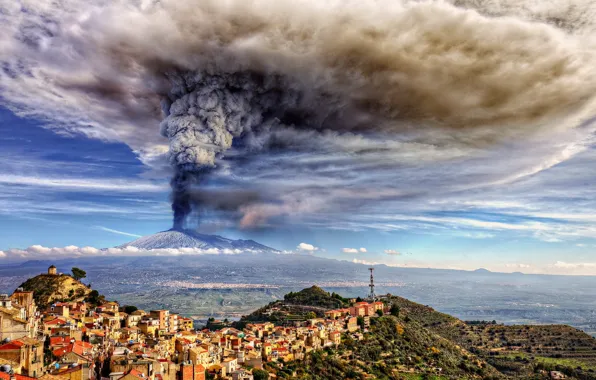 The sky, the city, ash, the volcano