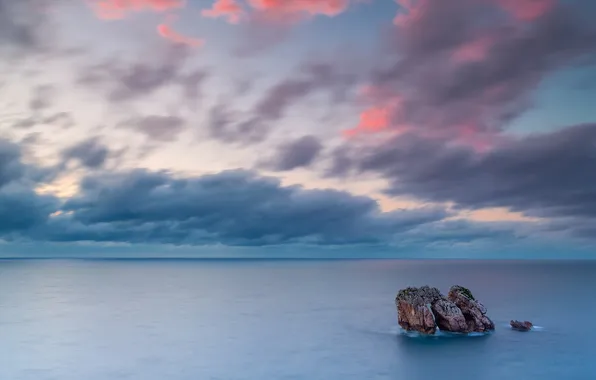 Sea, the sky, clouds, rocks