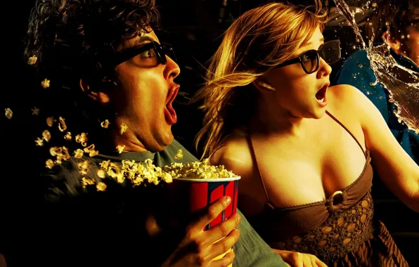Picture girl, squirt, guy, popcorn, violent emotions, in the cinema