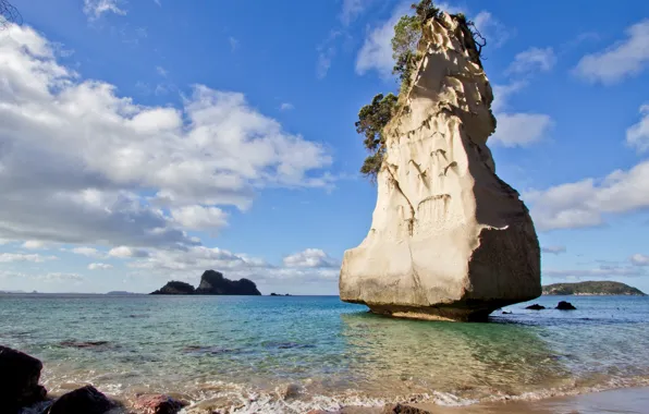 Sand, sea, the sky, clouds, stones, rocks, shore