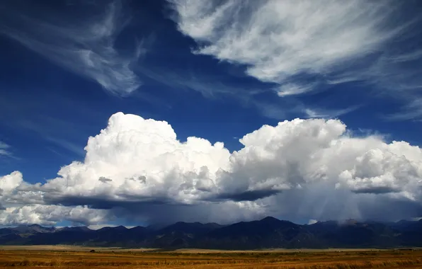 Picture field, the sky, clouds, mountains