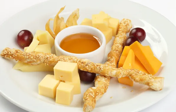 Picture cheese, honey, grapes, cuts