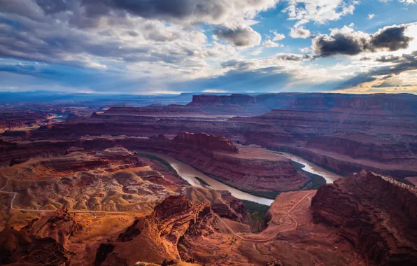 The sky, clouds, mountains, river, canyon