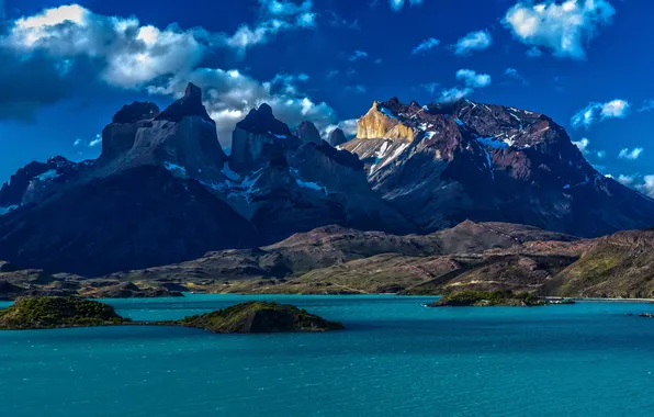 The sky, clouds, light, mountains, blue, stones, rocks, shore