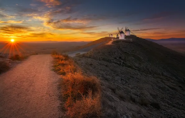 Road, the sun, rays, sunset, dawn, mountain, hill, hill