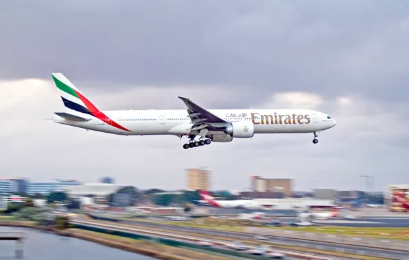 Picture the city, airport, Boeing, the plane, 300, 777, Landing, emirates