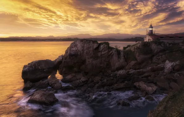 Sea, sunset, rocks, lighthouse