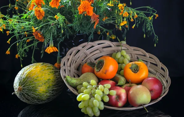 Apple, grapes, pear, fruit, melon, persimmon, marigolds