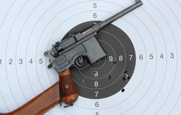 Picture metal, gun, pistol, wood, bullet, performance, target, holes.