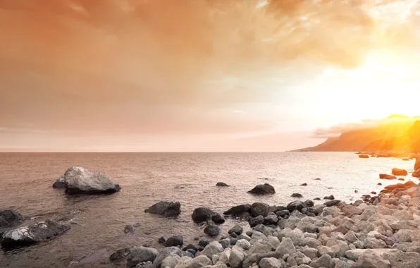 Sea, the sky, sunset, stones, shore, rocky shore, the rays of the sun
