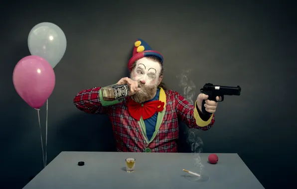 Gun, balls, bottle, clown