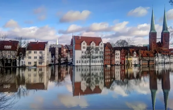 Picture the sky, water, clouds, trees, reflection, building, Europe, houses